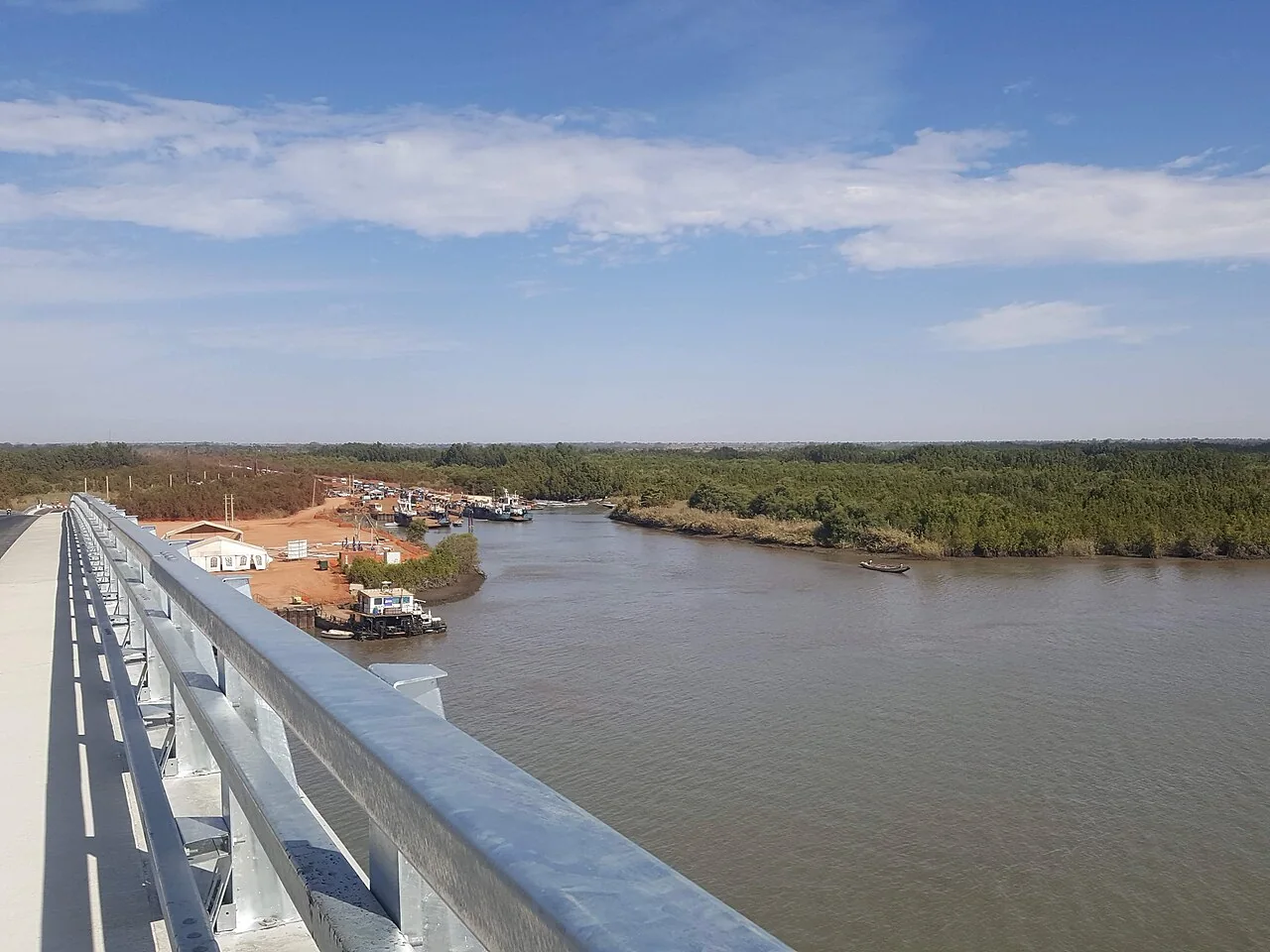 The roadway of the Senegambia Bridge viewed from its peak looking north